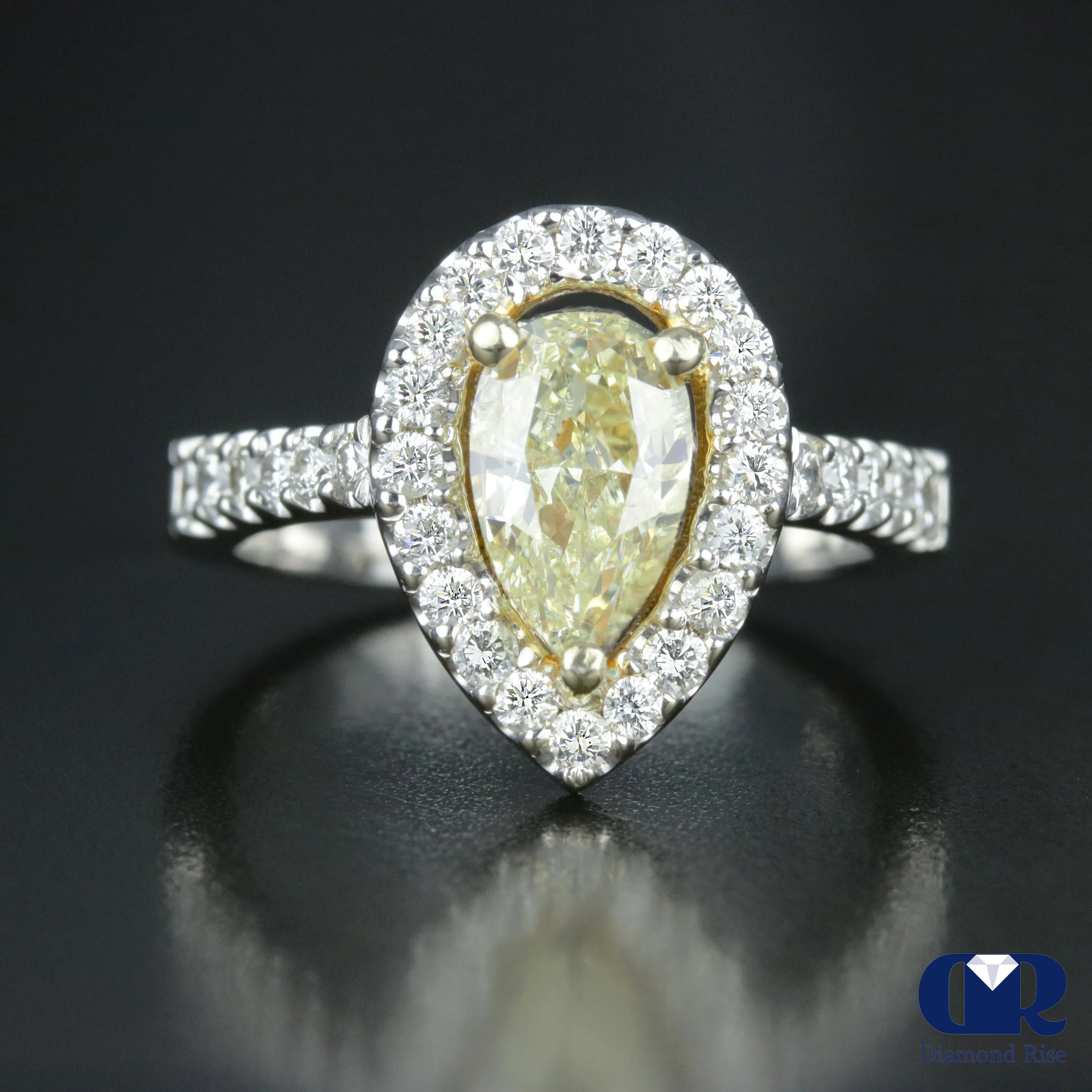 2.23 Carat Pear Cut Fancy Yellow Diamond Halo Engagement Ring In 14K White Gold