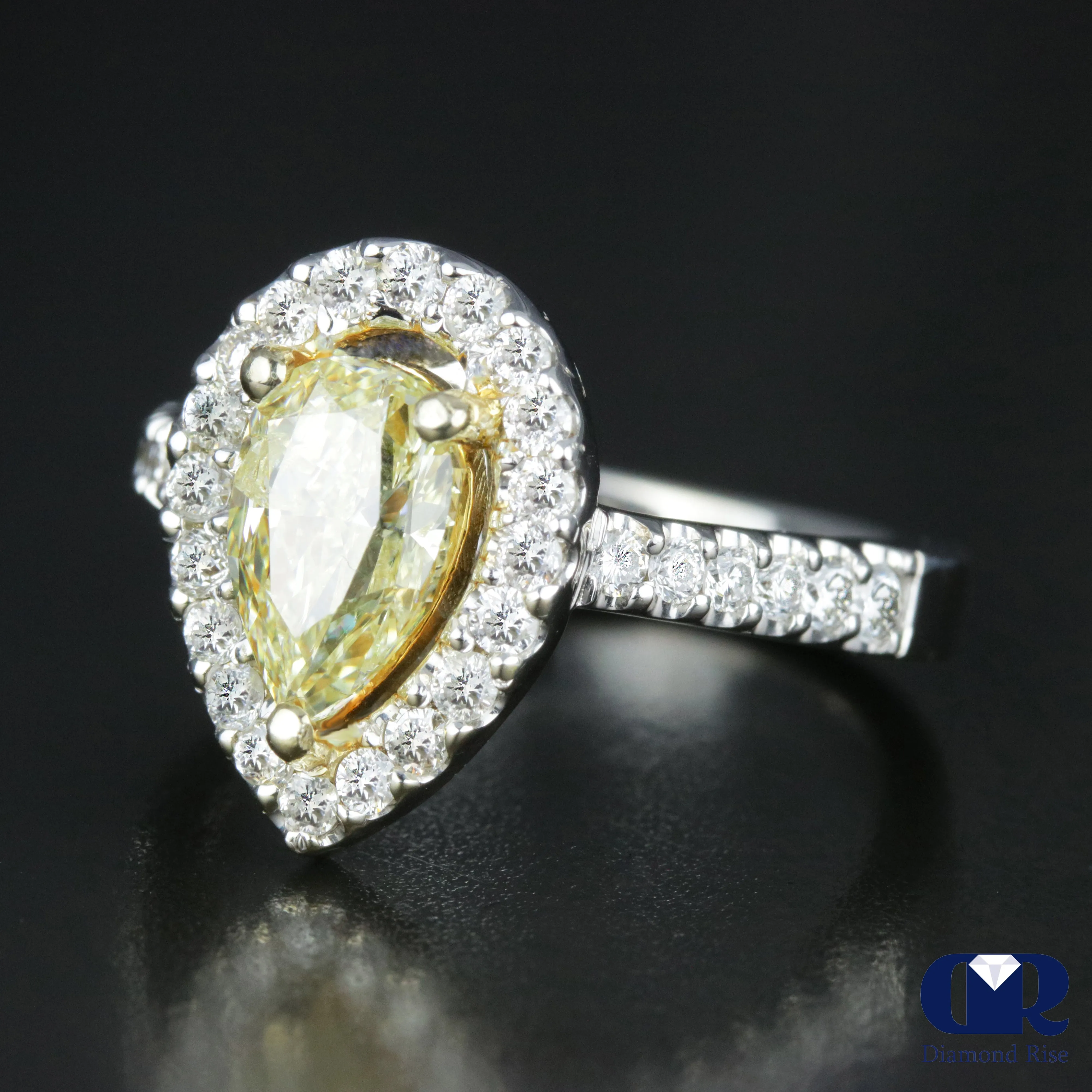 2.23 Carat Pear Cut Fancy Yellow Diamond Halo Engagement Ring In 14K White Gold