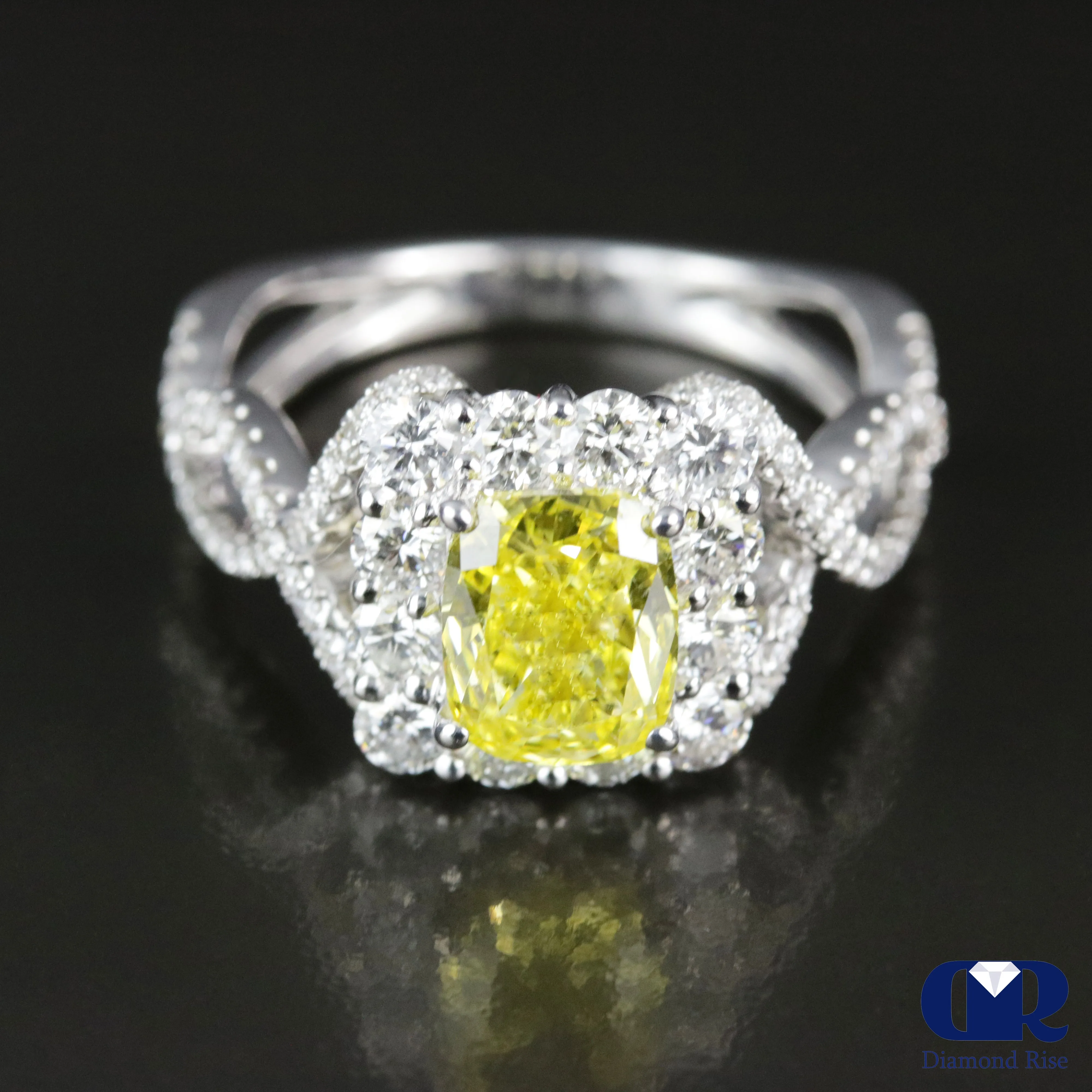 2.45 Carat Fancy Yellow Cushion Cut Diamond Twisted Engagement Ring In 18K White Gold