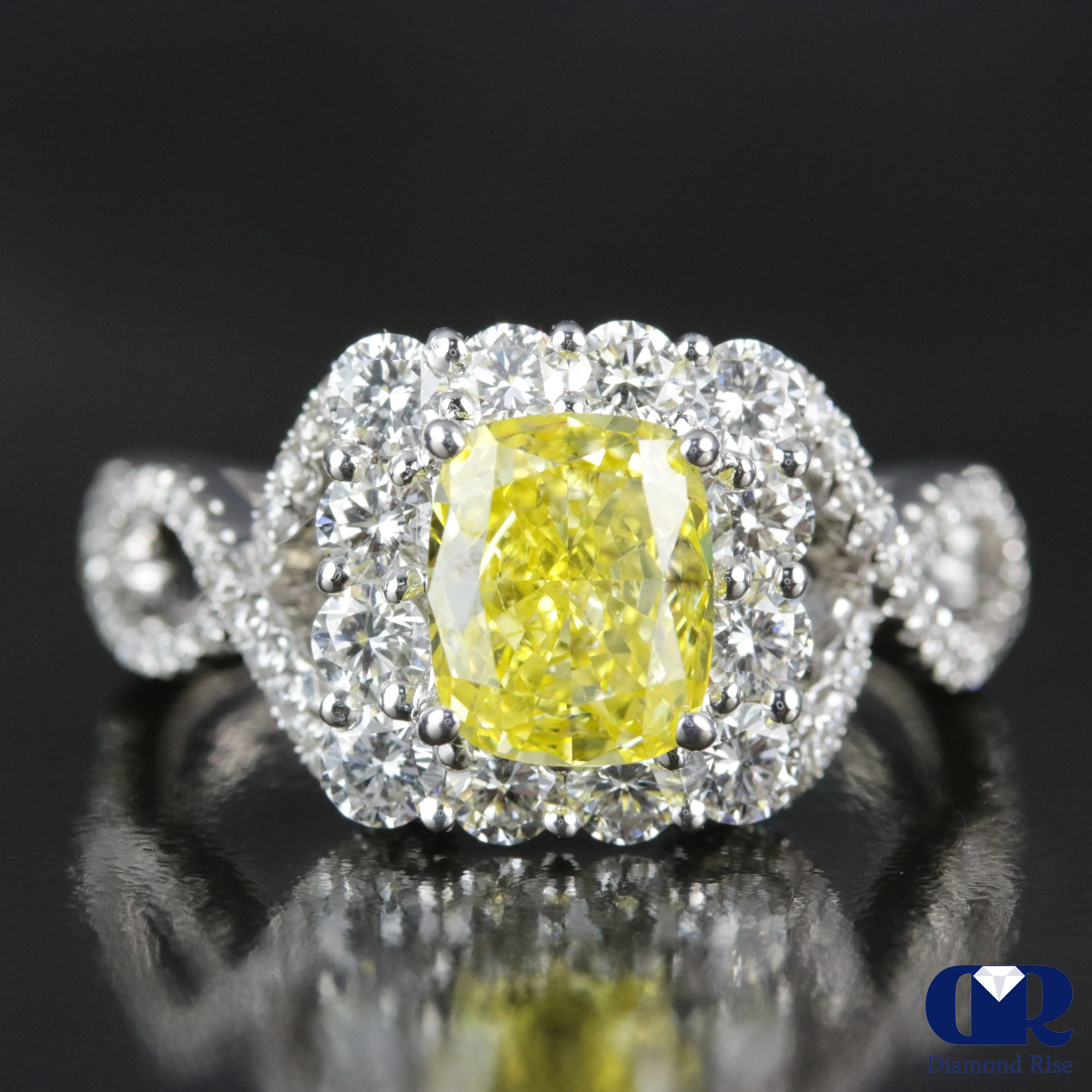 2.45 Carat Fancy Yellow Cushion Cut Diamond Twisted Engagement Ring In 18K White Gold